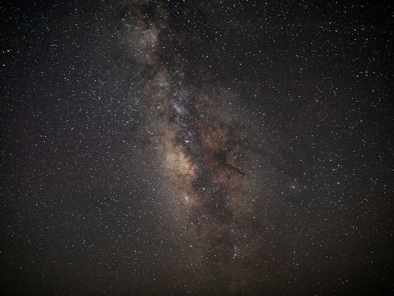 12 August 2023, Egypt, Faiyum: The Milky Way galaxy appears in the sky above the natural reserve are...