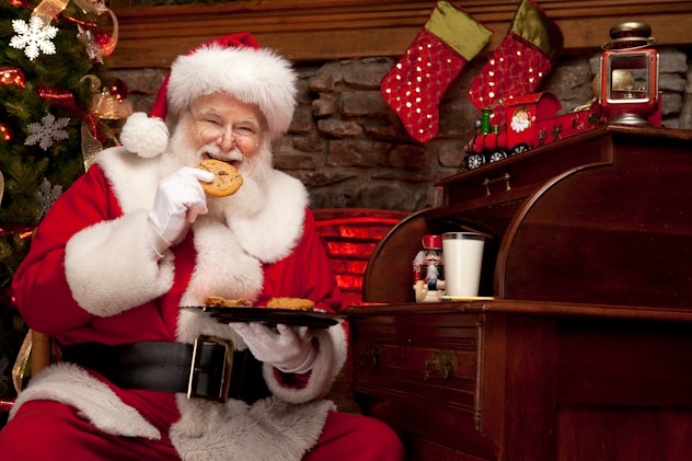 Pictures of Real Santa Claus enjoying milk and cookies