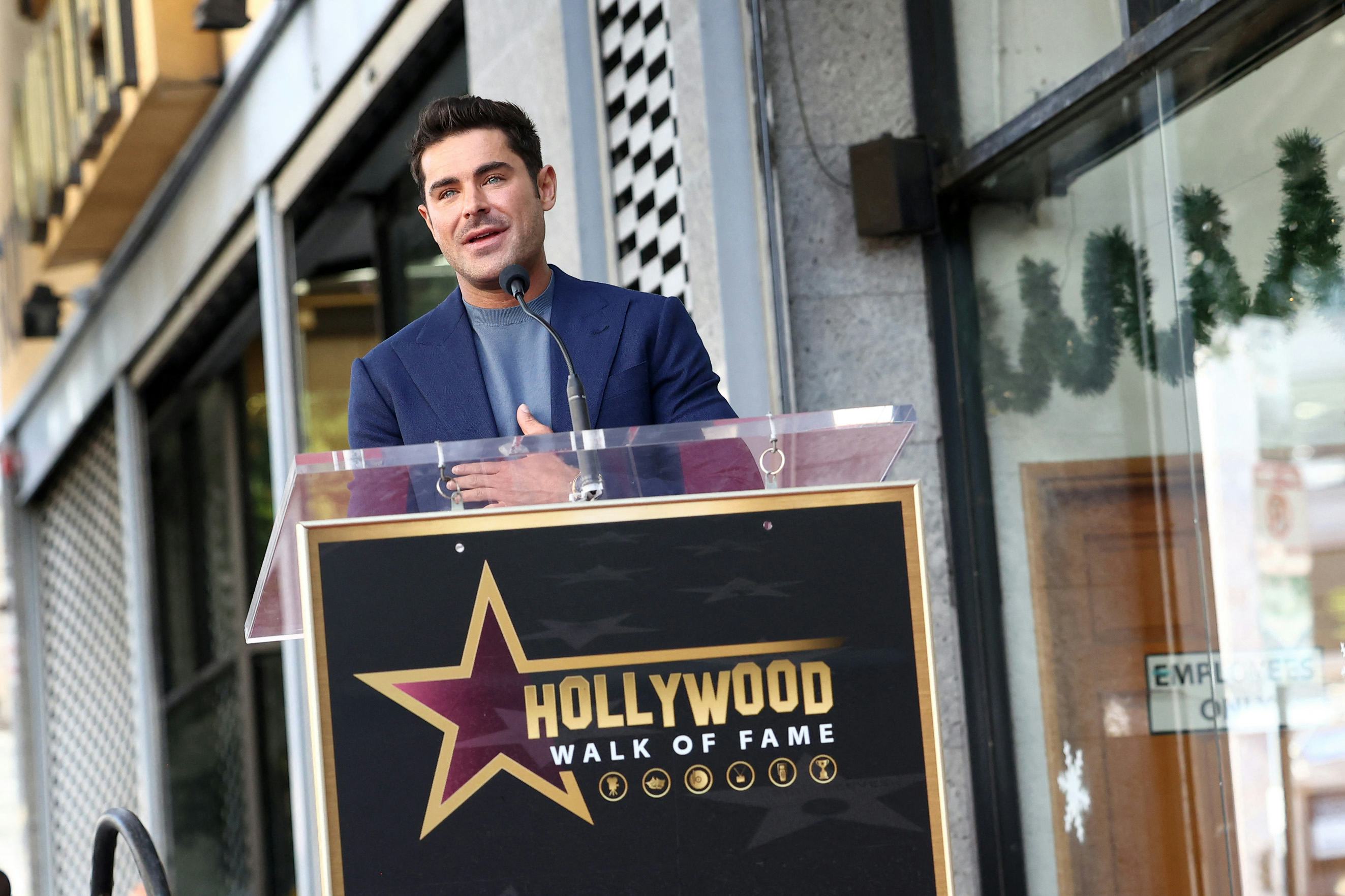 Zac Efron poses speaks during his Hollywood Walk of Fame ceremony in Hollywood.