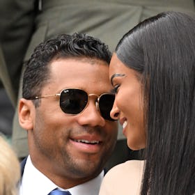 LONDON, ENGLAND - JUNE 30:  Russell Wilson and Ciara smile at each other as they attend Day Four of ...