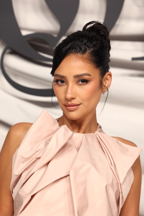 Shay Mitchell debuted a new cowboy copper hair color in Dec. 2023, cementing the red shade's status ...