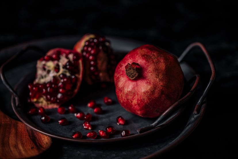 Still life with pomegranates, which are a winter solstice food