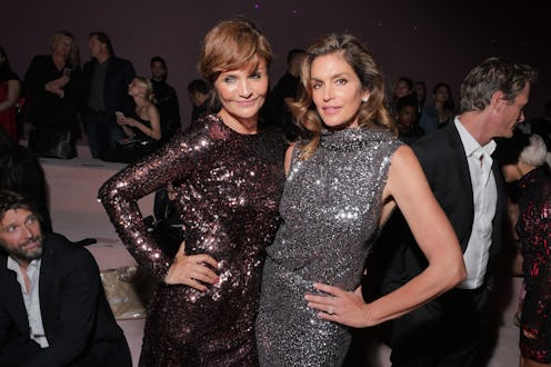 Helena Christensen and Cindy Crawford in the front row (Photo by Swan Gallet/WWD/Penske Media via Ge...