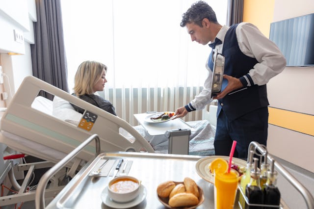 A woman gets served a meal at the hospital. Many women think about how nice it would be to have a mi...