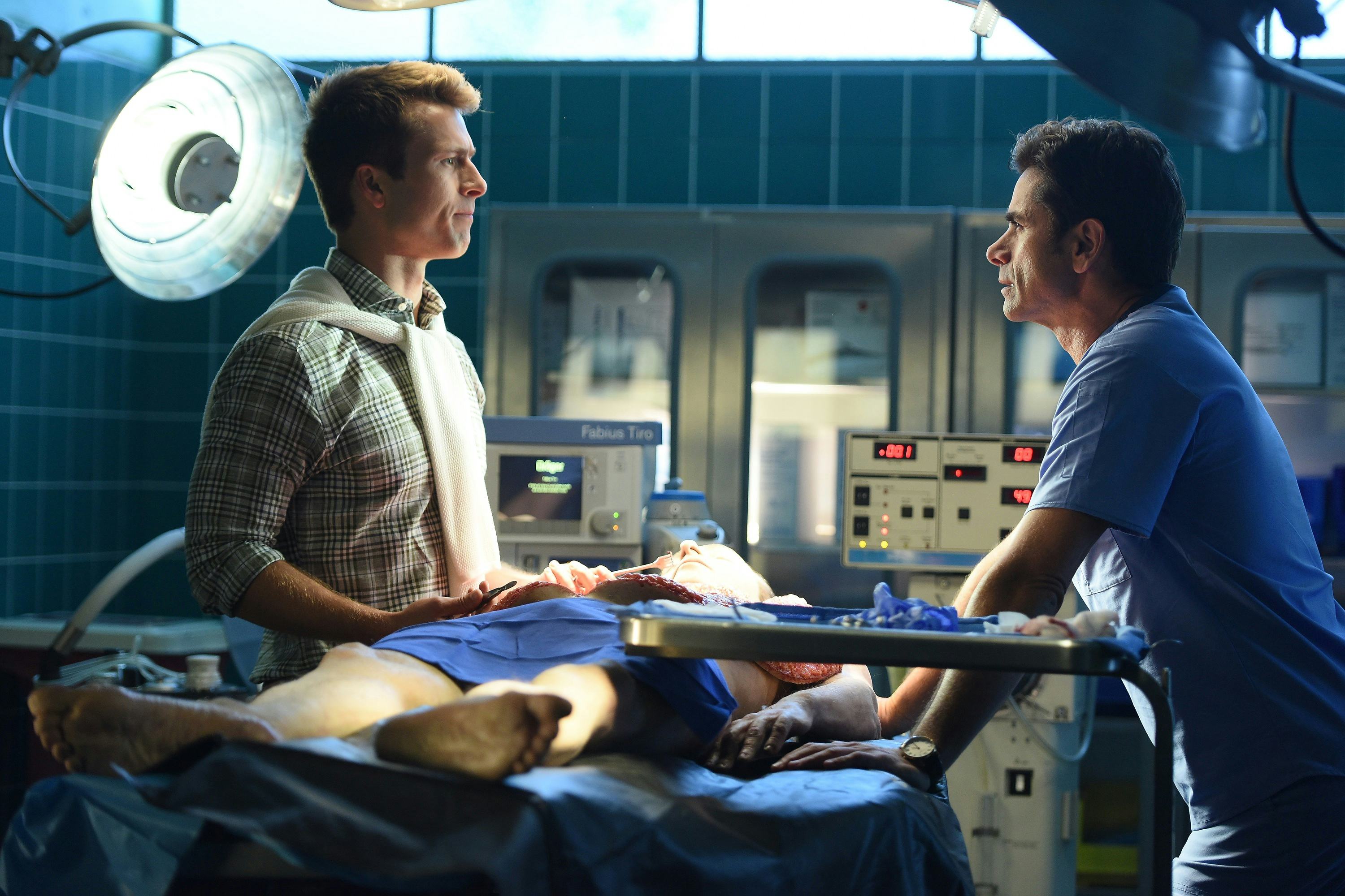 Glen Powell and John Stamos