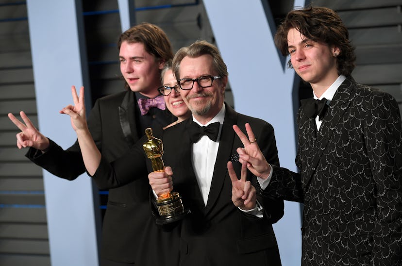Gary Oldman (second right) with wife Gisele Schmidt and sons Gulliver Oldman (right) and Charlie Old...