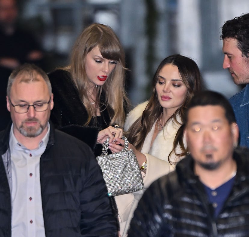 NEW YORK, NEW YORK - DECEMBER 14: Taylor Swift, Keleigh Sperry and Miles Teller leave The Box after ...