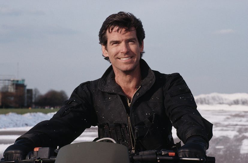 Irish actor Pierce Brosnan as 007, driving a Cagiva motorcycle for the opening scene of the James Bo...