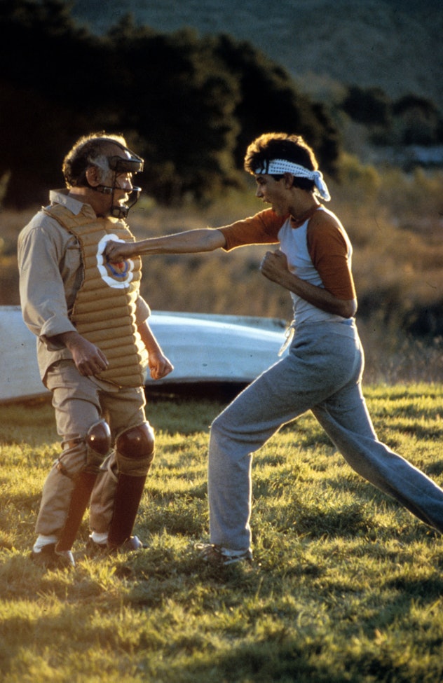 Ralph Macchio punches a dummy in a scene from the film 'The Karate Kid', 1984. (Photo by Columbia Pi...