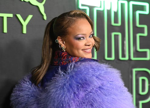 Just before New Year's Eve, Rihanna stepped out in a shimmering purple eyeshadow makeup look and ret...