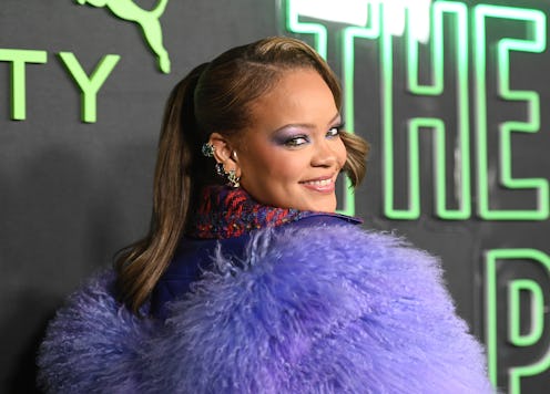 Just before New Year's Eve, Rihanna stepped out in a shimmering purple eyeshadow makeup look and ret...