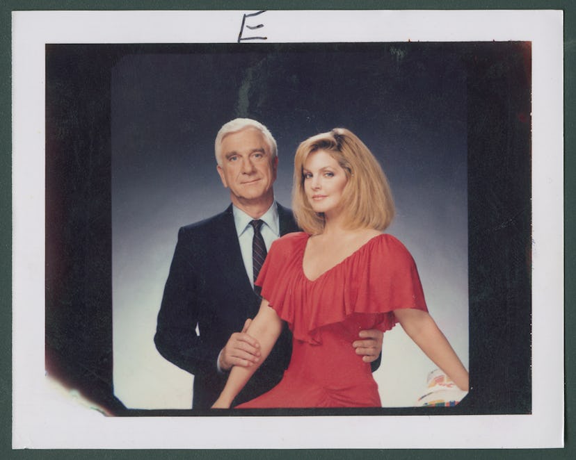 Portrait of actors Leslie Nielsen (1926 - 2010) and American actress Priscilla Presley as they pose ...
