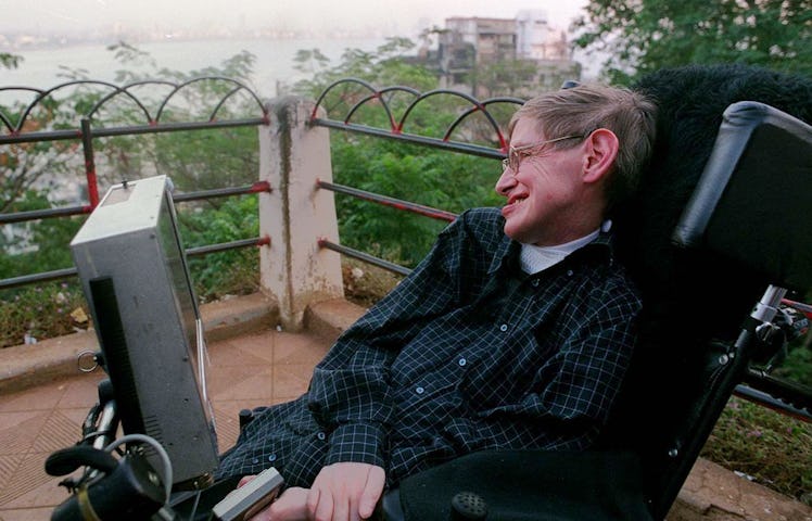 BOMBAY, INDIA:  World-renowned physicist Stephen Hawking looks at the Bombay city skyline while sigh...