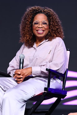 Oprah natural curls in purple jumpsuit 2023