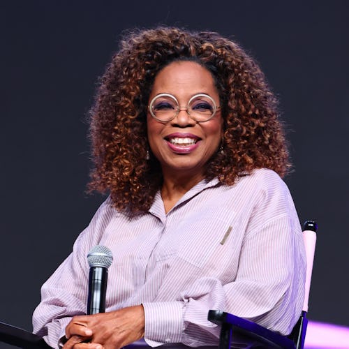 Oprah natural curls in purple jumpsuit 2023