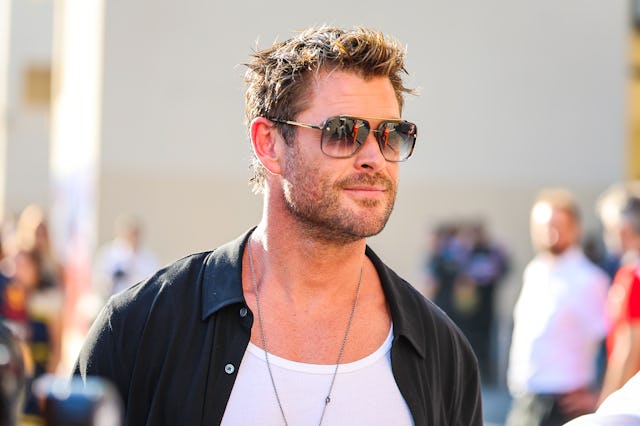 ABU DHABI, UNITED ARAB EMIRATES - NOVEMBER 26: Australian actor Chris Hemsworth walks in the paddock...