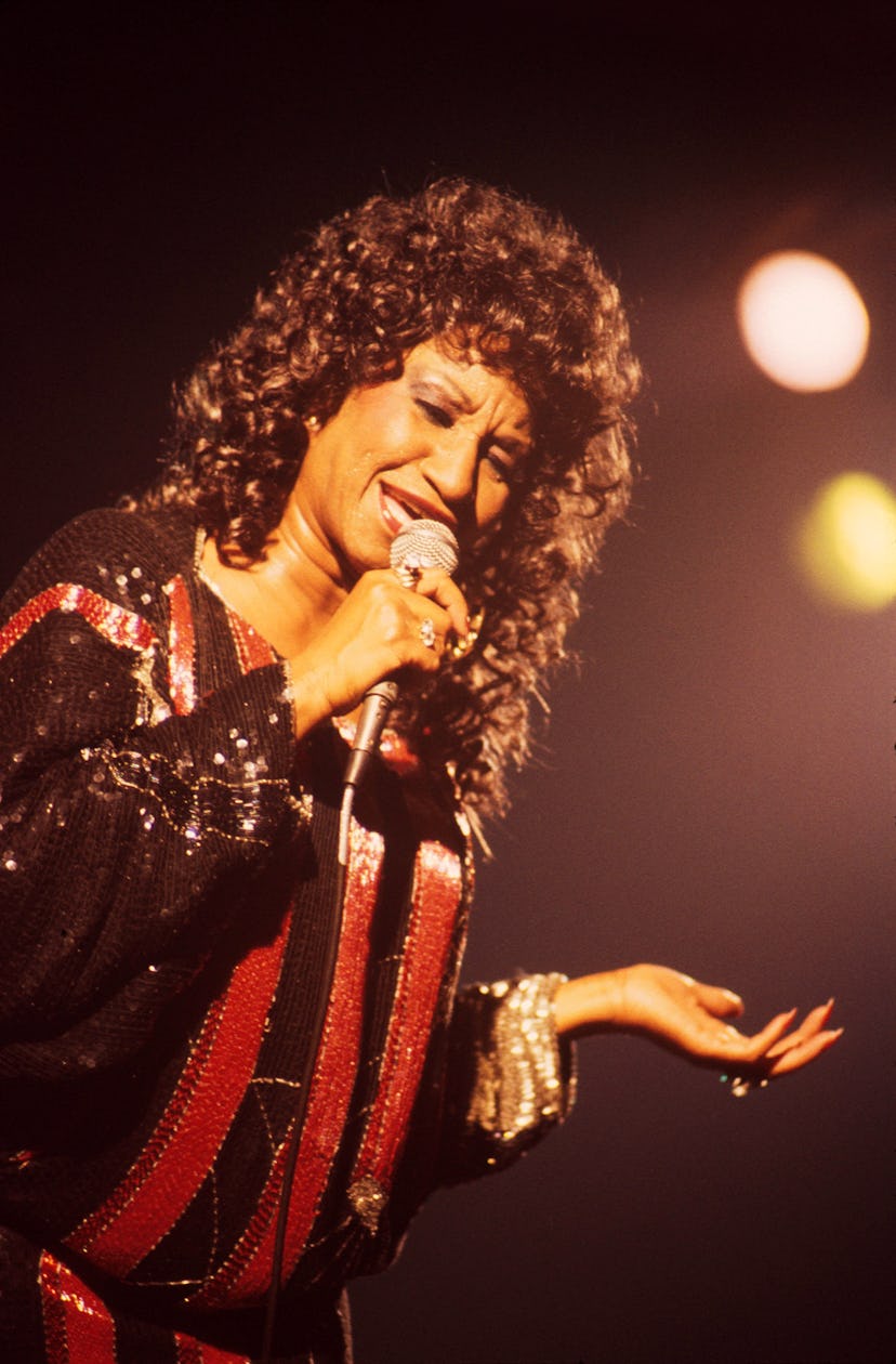 Celia Cruz performing with Tito Puente, London, 1986. (Photo by Michael Putland/Getty Images)