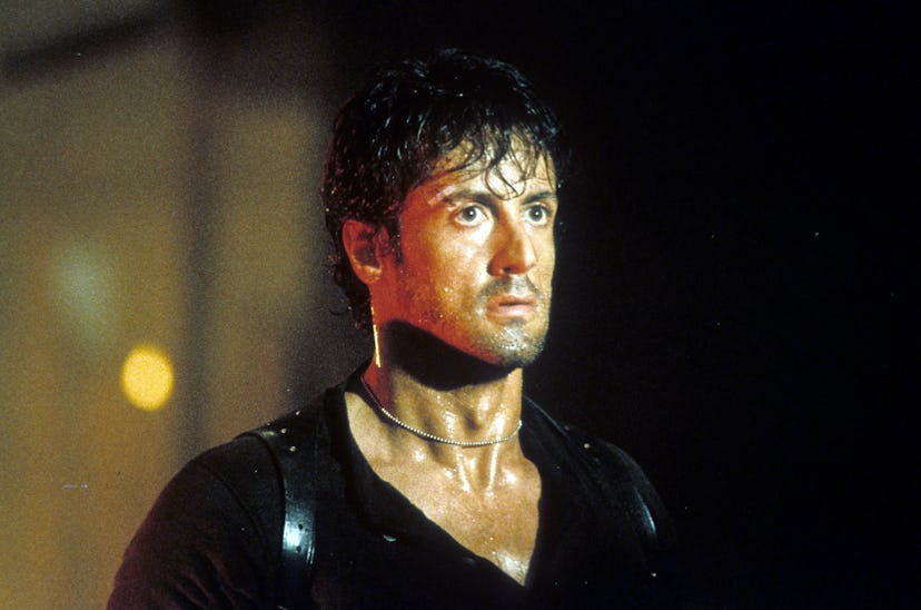 Sylvester Stallone drenched in sweat in a scene from the film 'Cobra', 1986. (Photo by Warner Brothe...