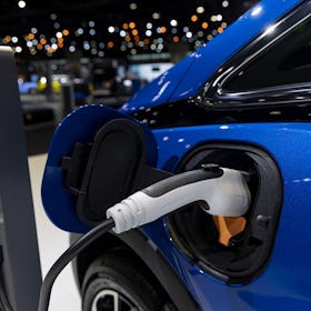 A charging port on a Chevrolet Bolt EV is on display during a preview day for the Chicago Auto Show ...