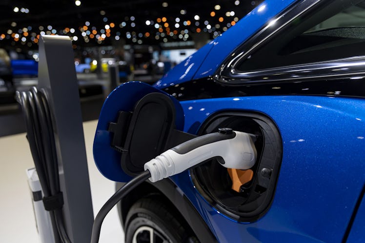 A charging port on a Chevrolet Bolt EV is on display during a preview day for the Chicago Auto Show ...