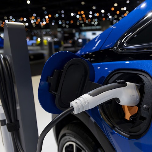 A charging port on a Chevrolet Bolt EV is on display during a preview day for the Chicago Auto Show ...