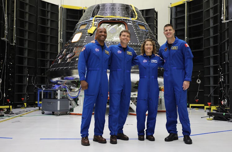 Left to right, Artemis II astronauts Pilot Victor Glover, Commander Reid Wiseman, and Mission Specia...