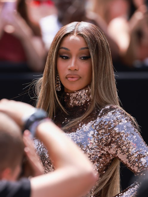 Ahead of New Year's Eve, Cardi B shared her bedazzled French tip manicure.