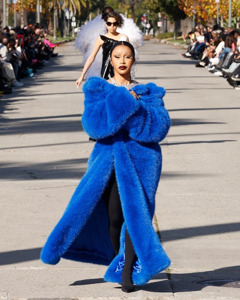 LOS ANGELES, CALIFORNIA - DECEMBER 02: Cardi B walks the runway down South Windsor Boulevard during ...