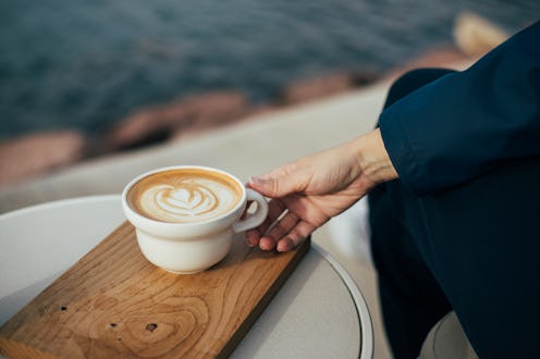 Coffee cup Latte art on wooden table