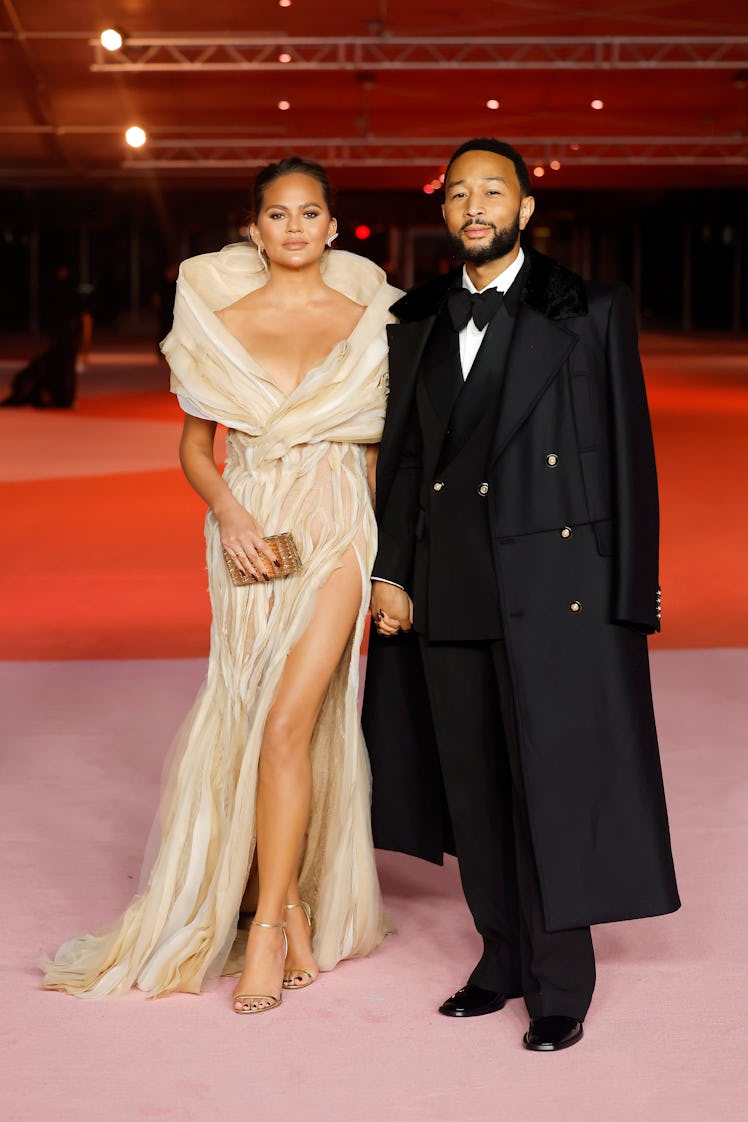 Chrissy Teigen and John Legend attend the Academy Museum of Motion Pictures
