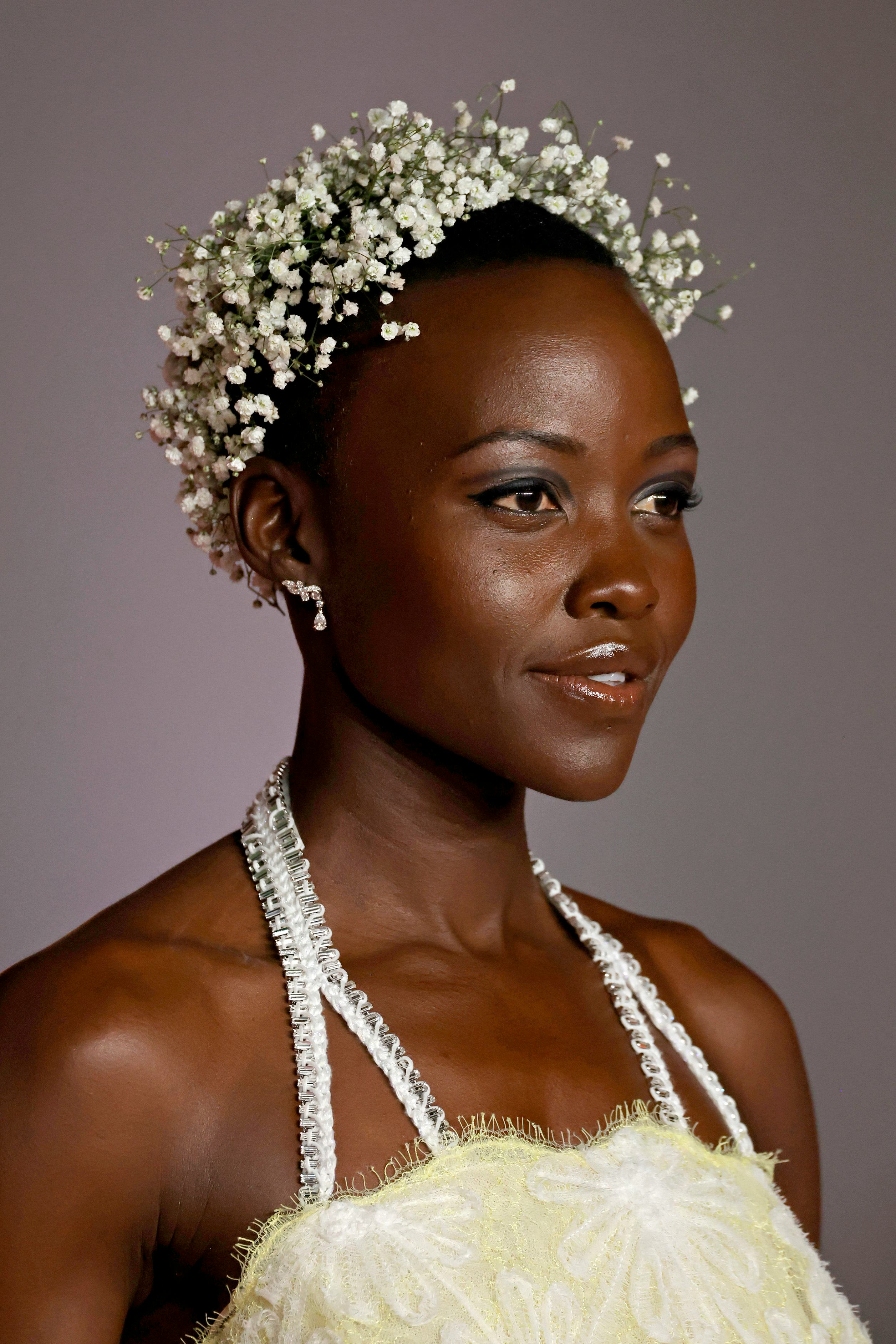 Lupita Nyong&rsquo;o attended the 3rd Annual Academy Museum Gala in 2023 with a halo of baby&rsquo;s breath flor&hellip;