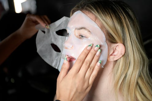 LOS ANGELES, CALIFORNIA - OCTOBER 16: A model in Florapy Beauty Skincare mask backstage during Los A...