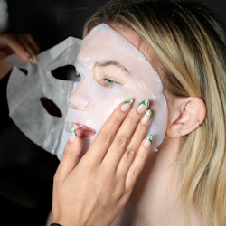LOS ANGELES, CALIFORNIA - OCTOBER 16: A model in Florapy Beauty Skincare mask backstage during Los A...