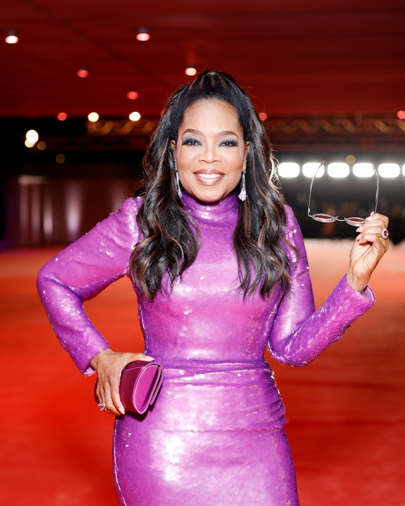 Oprah purple dress half-ponytail at Academy Gala