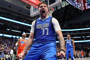 DALLAS, TEXAS - DECEMBER 02: Luka Doncic #77 of the Dallas Mavericks reacts after a basket in the fo...