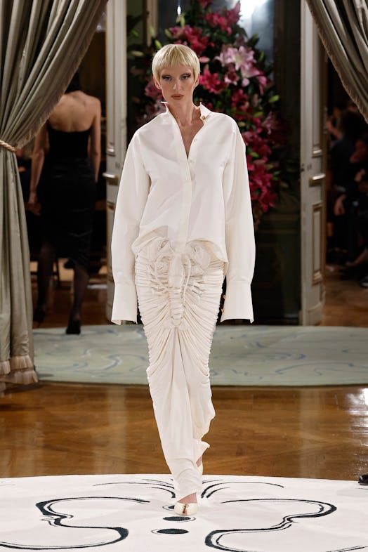 A model walks the runway during the Schiaparelli Womenswear Spring/Summer 2024 show as part of Paris...