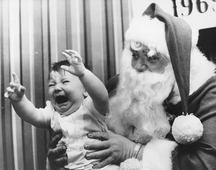 Baby screams in Santa's lap, in a story about how to prepare your kids to meet Santa.