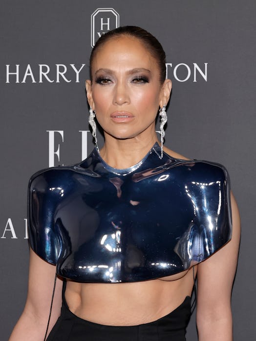 On Dec. 5, Jennifer Lopez attended the 2023 ELLE Women In Hollywood event with smoky eyes and gold c...
