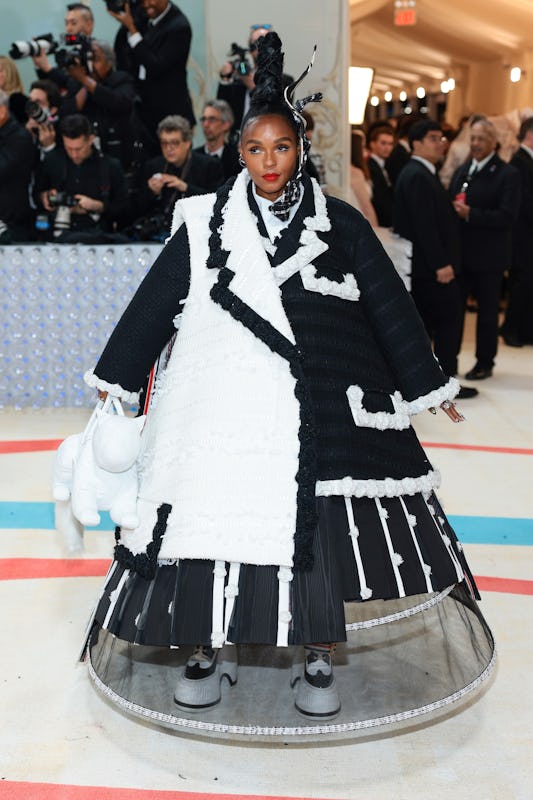 Janelle Monáe's first outfit at the 2023 Met Gala hid a revealing second outfit underneath.