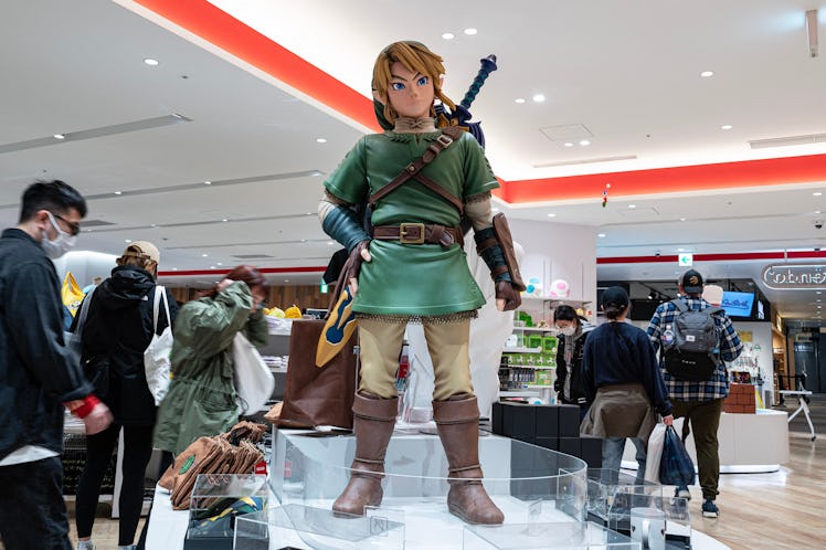 This photo taken on May 8, 2023 shows a display (C) for Japanese gaming giant Nintendo's long-runnin...