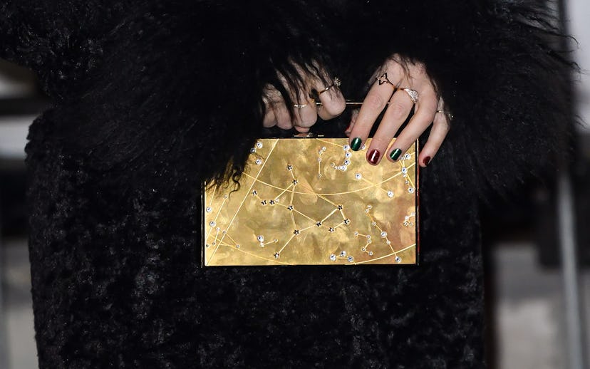 On Dec. 6, 2023, Taylor Swift attended the premiere of “Poor Things” with festive holiday-ready red …