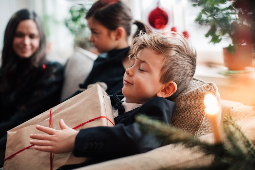 a kid is grateful for his gift, even though a relative gave too many presents this christmas