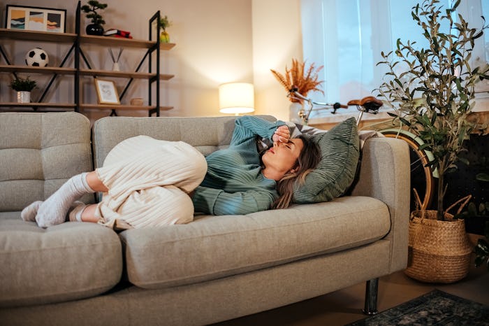 Brown discharge can be the cause of stomach cramping.