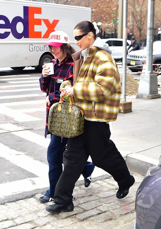 Bella Hadid was spotted with a vintage Louis Vuitton x Stephen Sprouse Speedy.