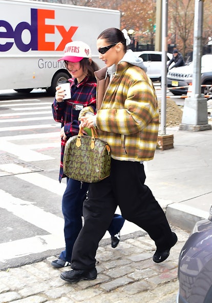 Bella Hadid was spotted with a vintage Louis Vuitton x Stephen Sprouse Speedy.  