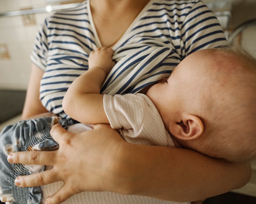 a person breastfeeding in an article about breastfeeding and discharge