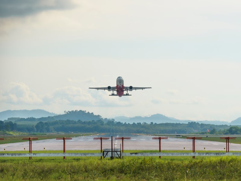 Passenger airplane taking of at airport