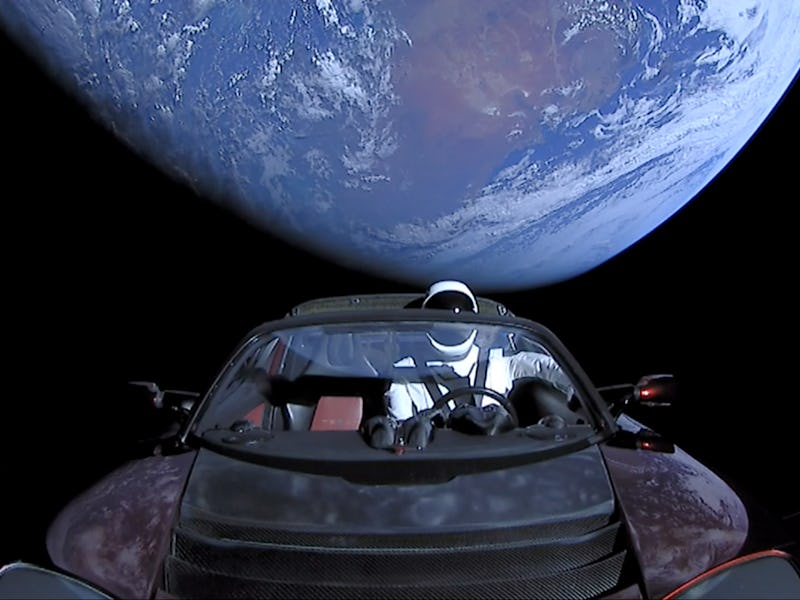 IN SPACE - FEBRUARY 8: In this handout photo provided by SpaceX, a Tesla roadster launched from the ...