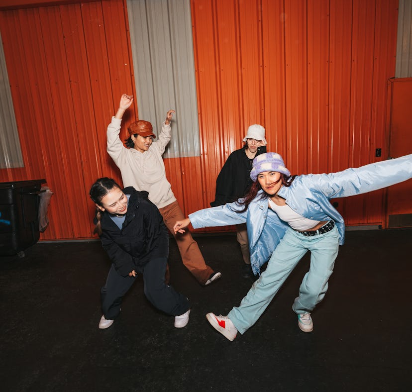 Group of four professional dancers exercising their zodiac sign's toxic traits.