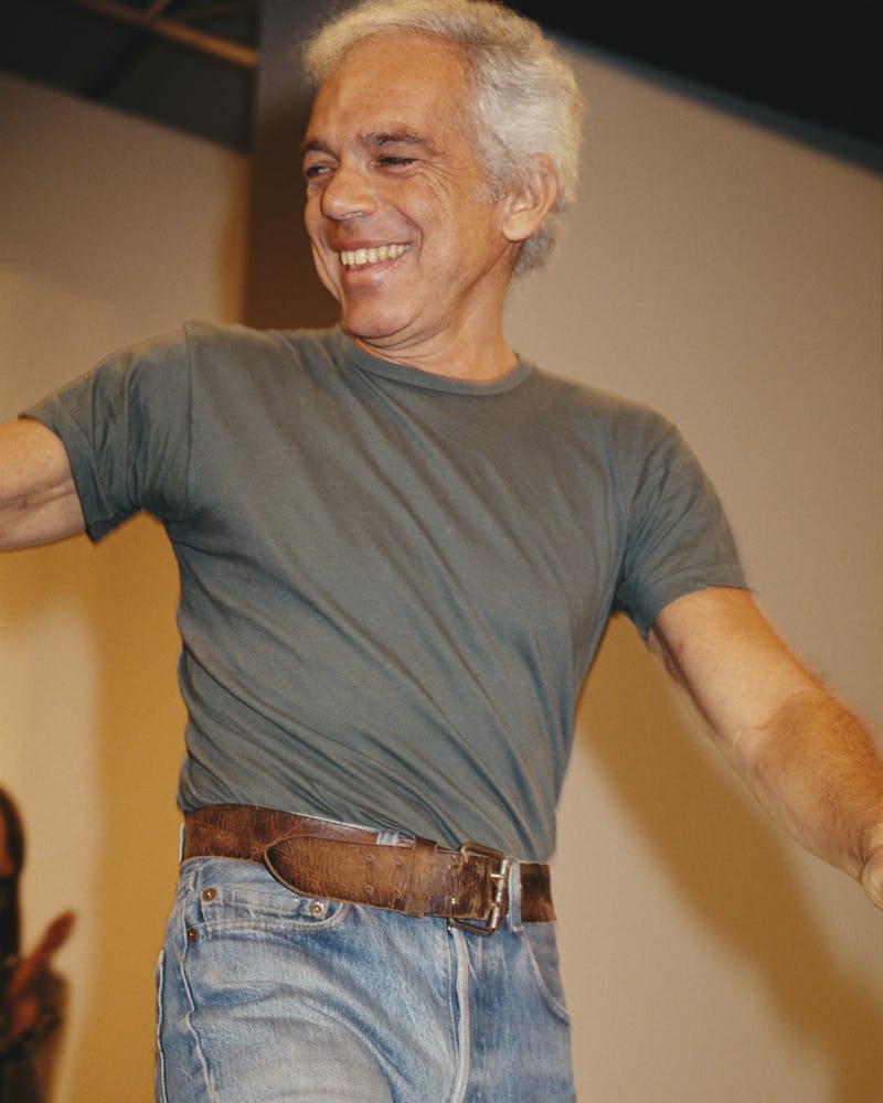 Fashion designer Ralph Lauren smiles from the catwalk at his Fall 1994 show